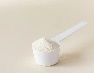 An image of a scoop containing collagen peptides